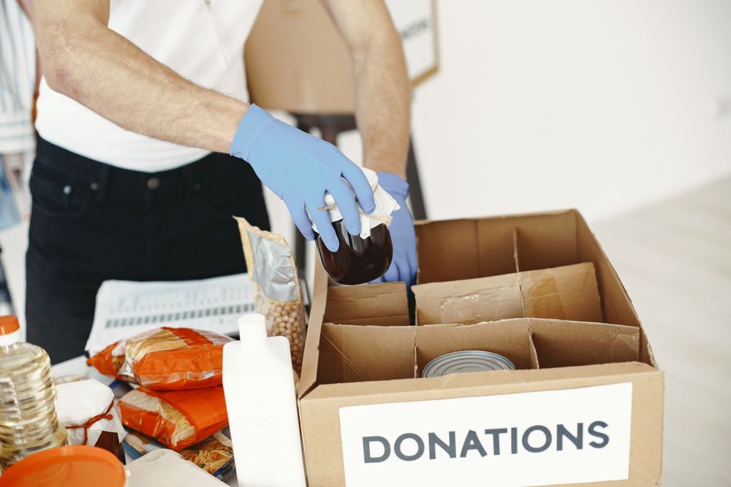 Packing a donation box for the food pantry