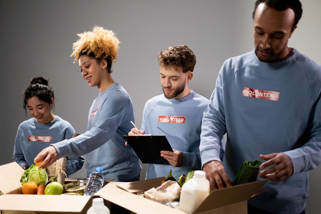 Volunteers packing food donations